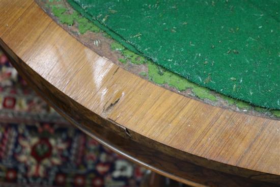 A Victorian walnut demi lune card table W.93cm